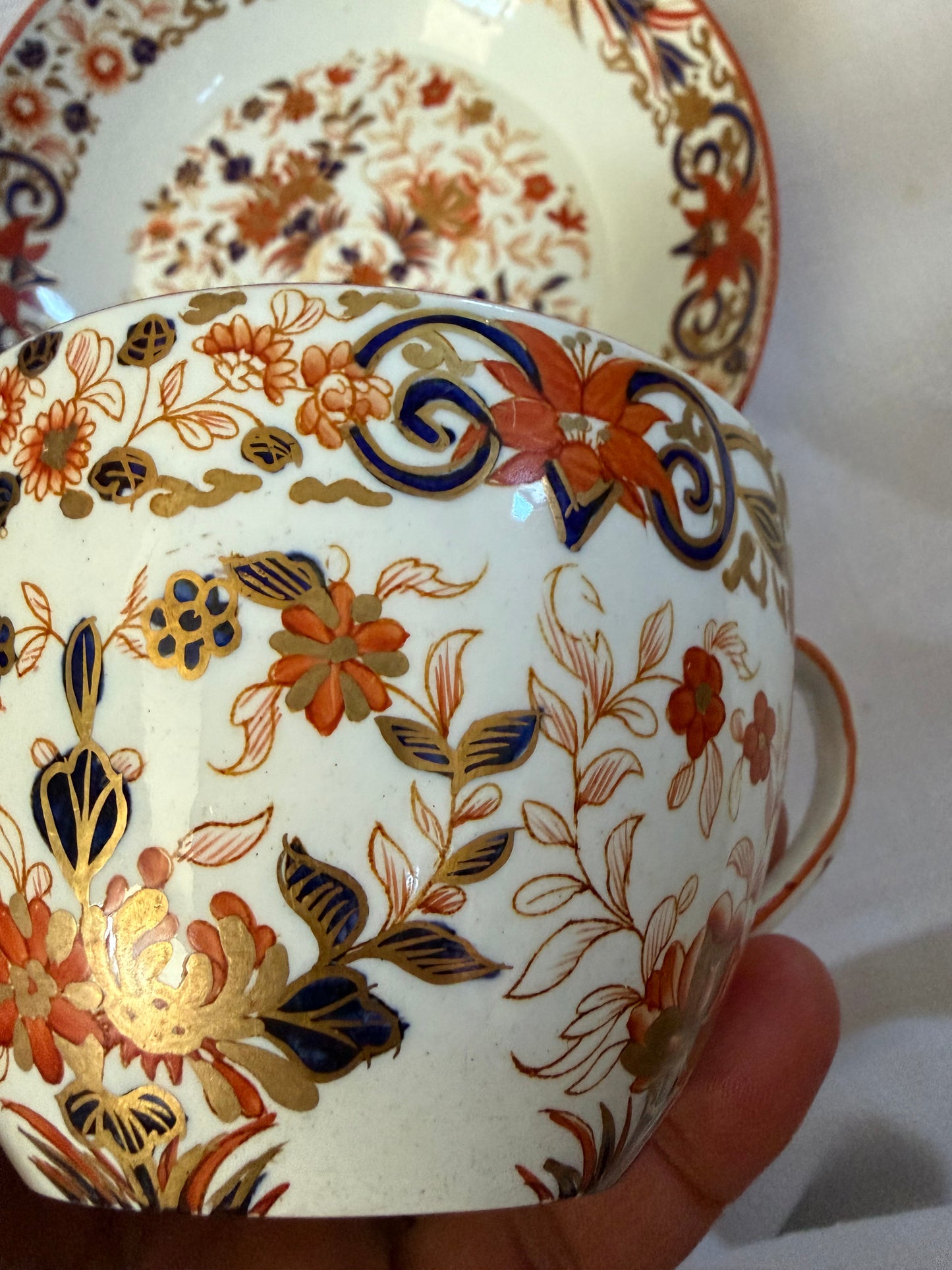 TEA CUP AND SAUCER