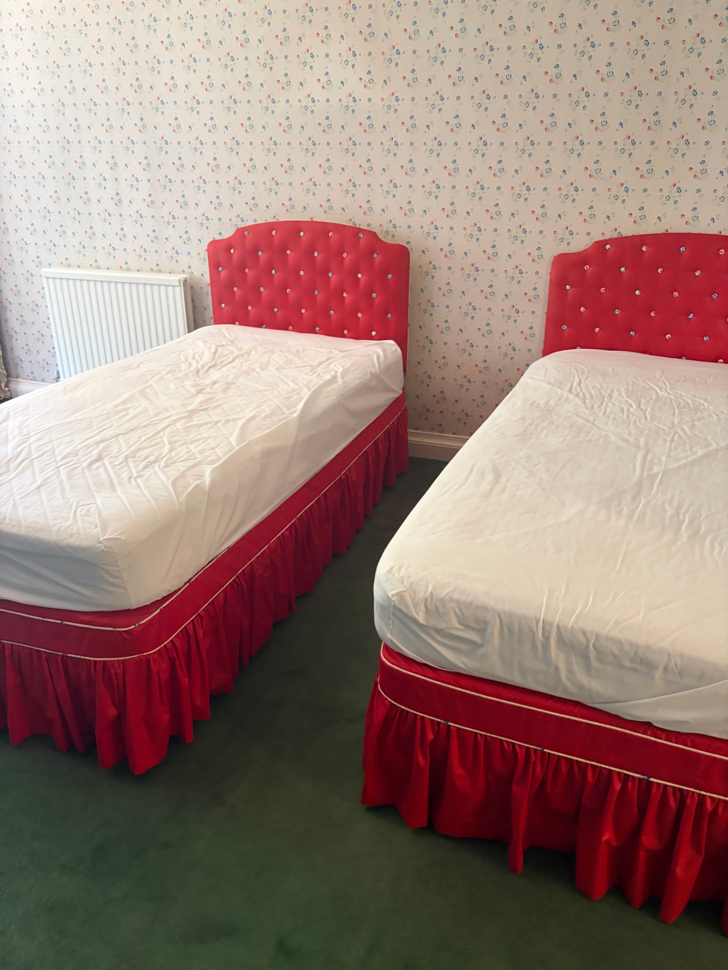 A PAIR OF SINGLE BEDS