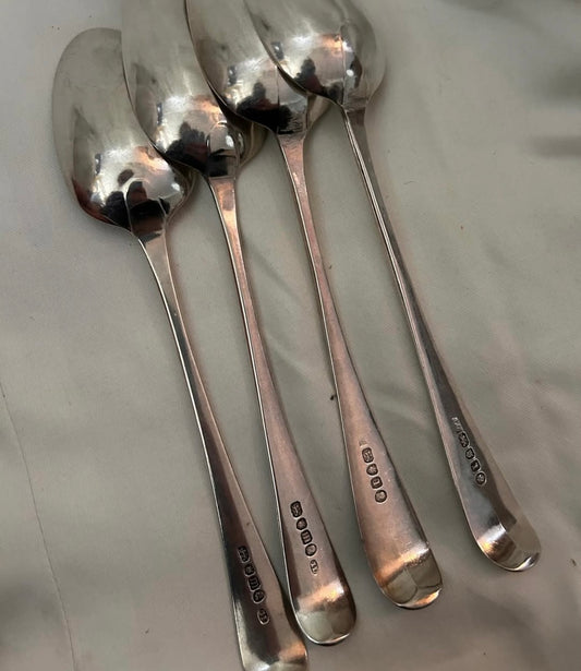 SOLID SILVER SPOONS