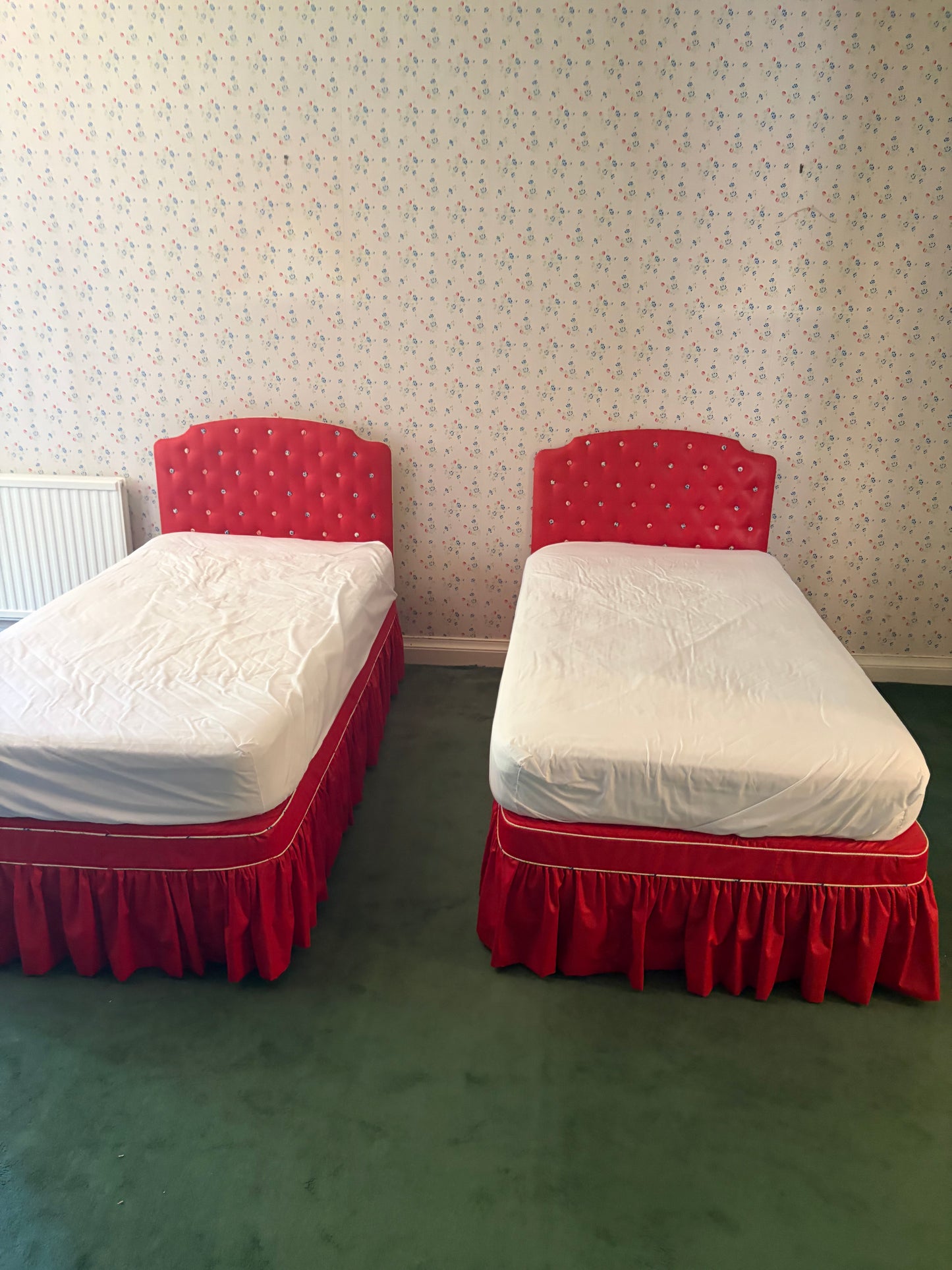 A PAIR OF SINGLE BEDS
