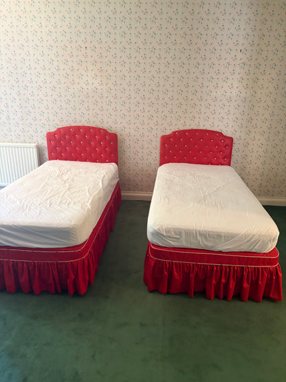 A PAIR OF SINGLE BEDS