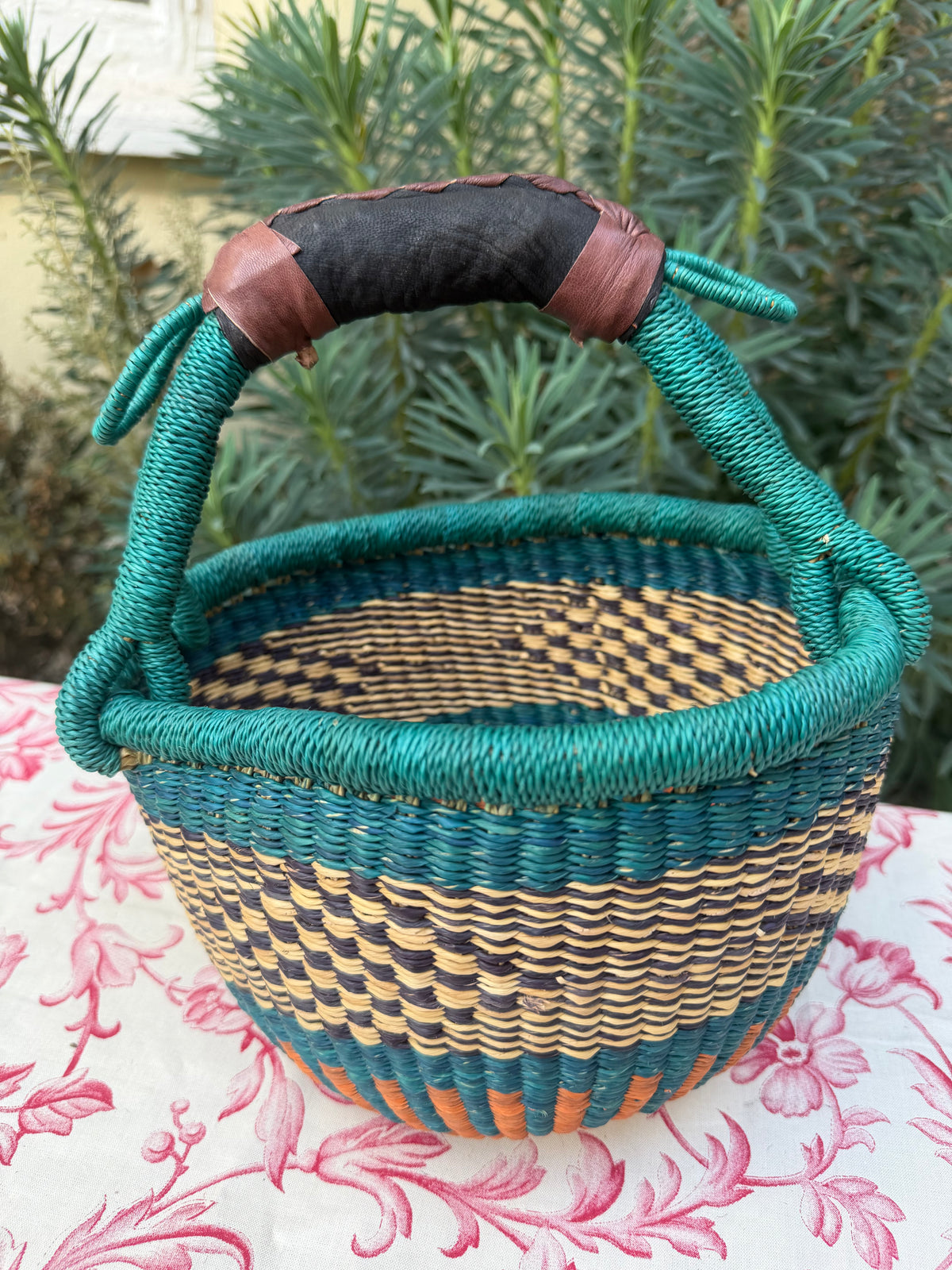 ￼ HAND WOVEN BASKET
