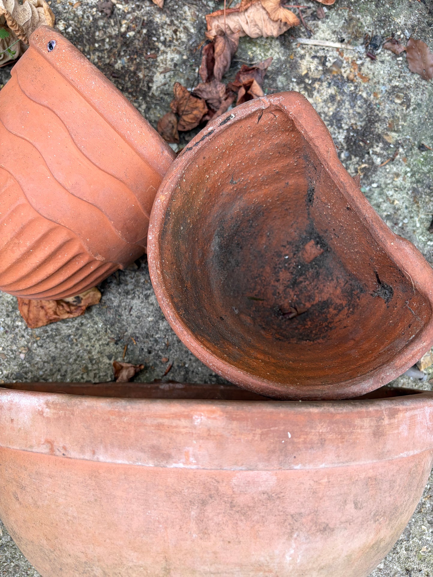 3 TERRACOTTA WALL BASKETS