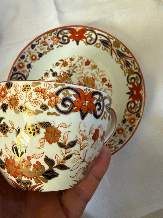 TEA CUP AND SAUCER