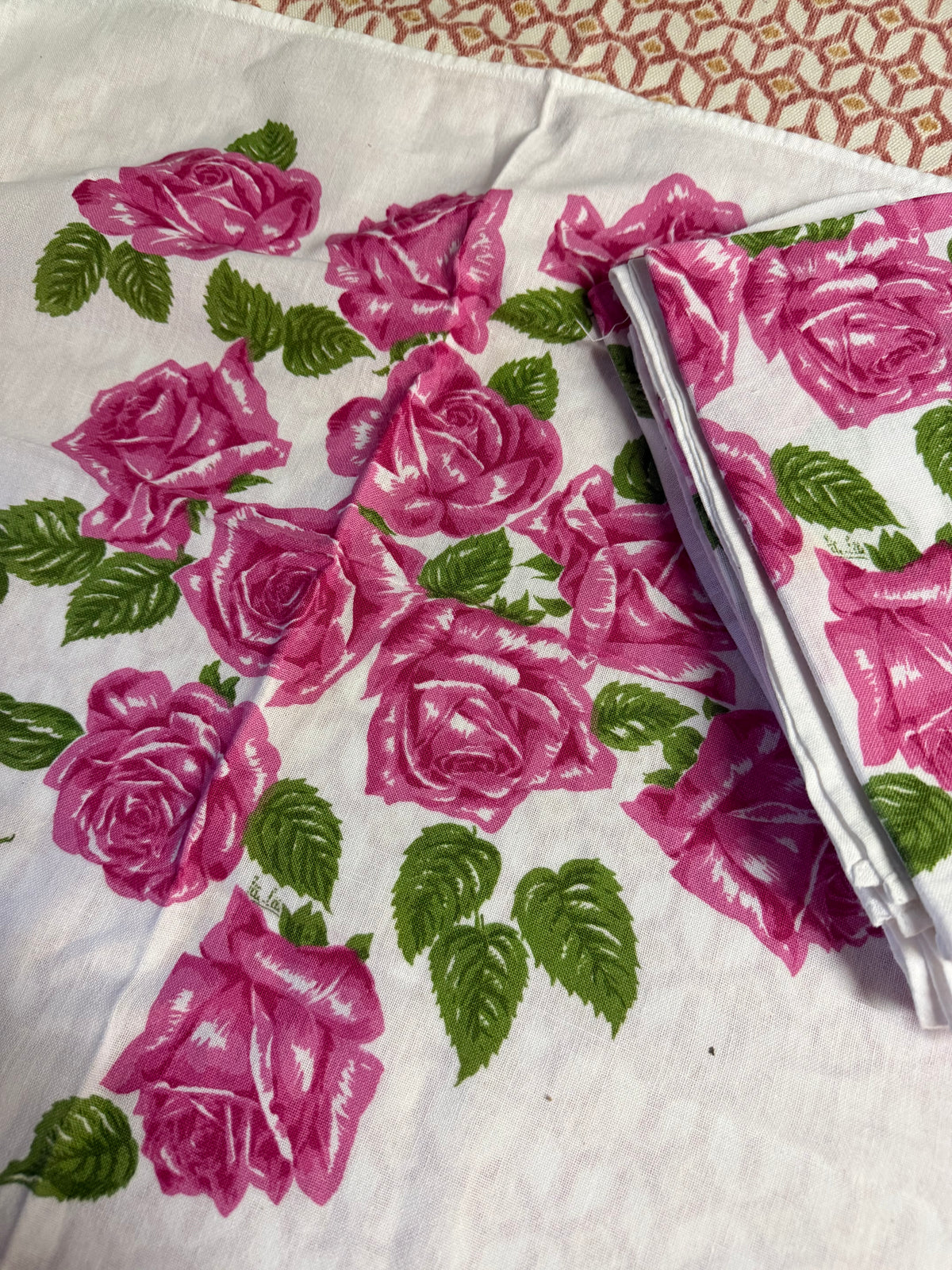 A SET OF ROSE NAPKINS
