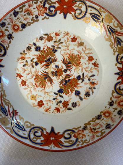 TEA CUP AND SAUCER