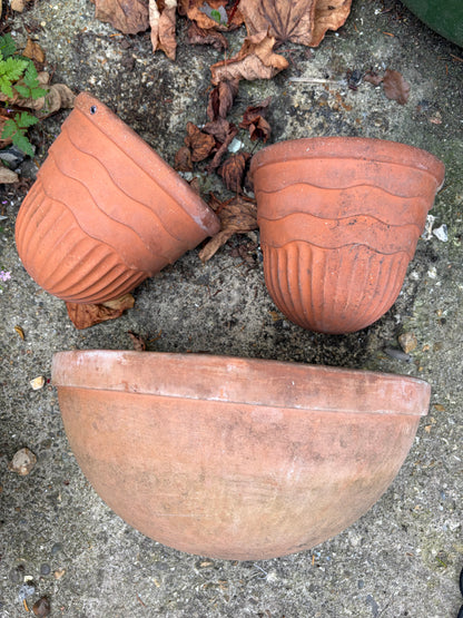 3 TERRACOTTA WALL BASKETS