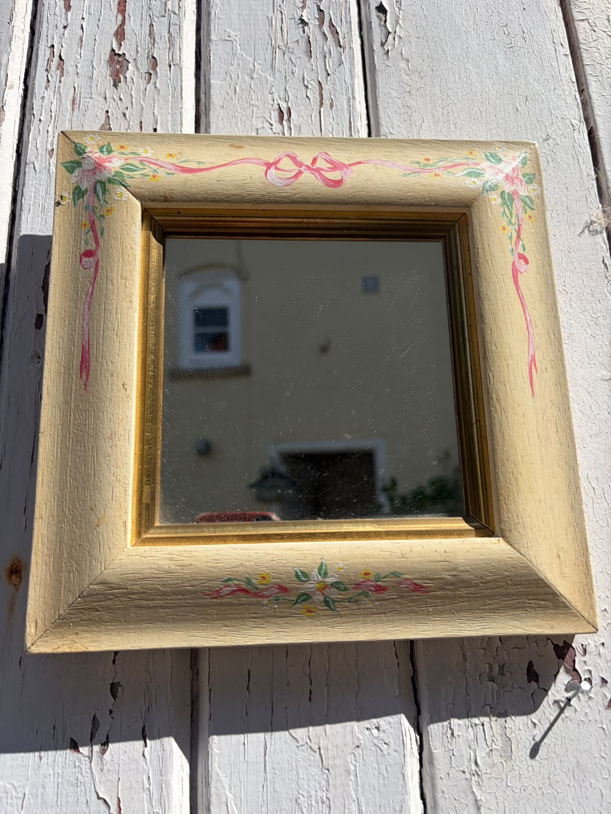 SMALL PAINTED MIRROR